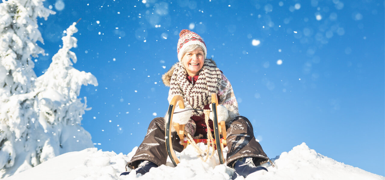 older women sledding